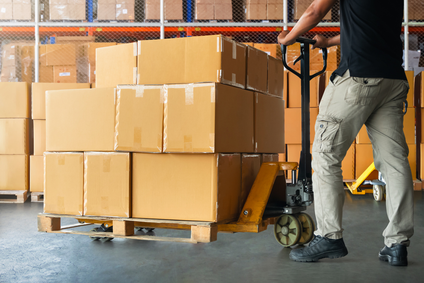 Workers Unloading Package Boxes on Pallets in Warehouse. Cartons, Parcel Boxes. Forklift Loader. Deliver Parcels to Customers. Supply Chain Shipment Goods. Distribution Supplies Warehouse Logistic.